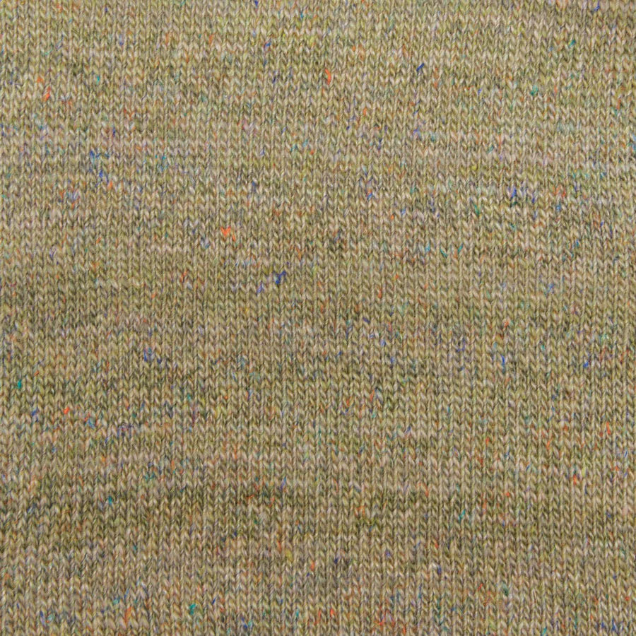 Close-up van Mayflower Premium Georgina met zichtbare vezels van wol, lyocell en linnen. Subtiele glans en zachte, natuurlijke textuur.